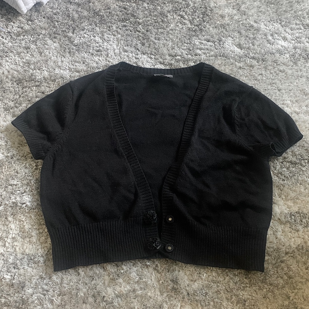 Ann Taylor shrug .